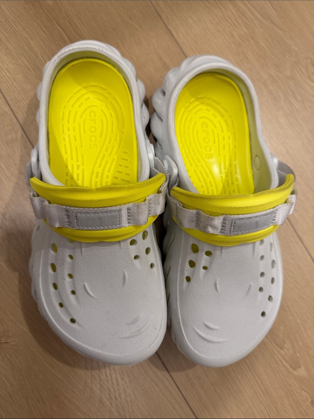 CROCS White Clogs with Yellow Insole and Strap Accent